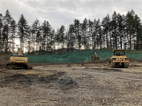 tank slope excavation with hydroseed
