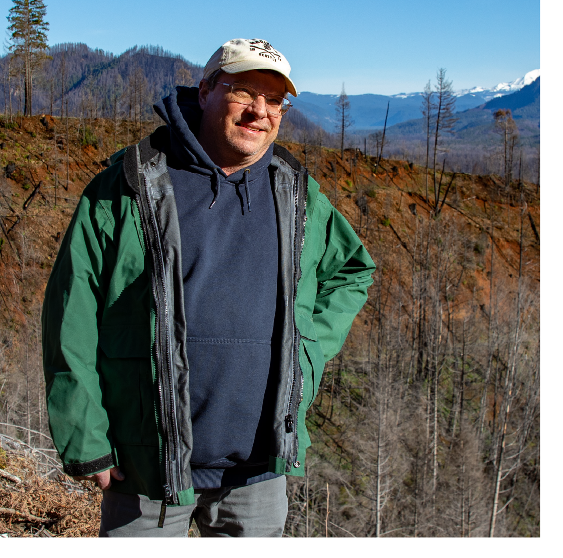 Karl Morgenstern surveys forest lands for potential watershed conservation sites