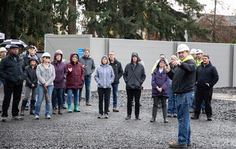 crowd learns more about the substation